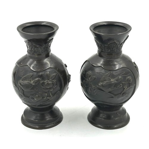 340 - A pair of Japanese Meiji period bronze vases. 16cm h.