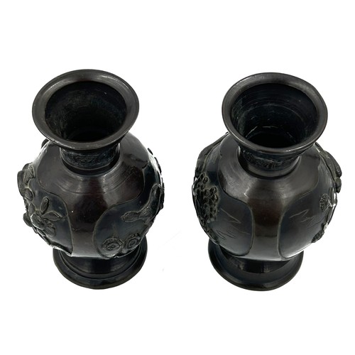 340 - A pair of Japanese Meiji period bronze vases. 16cm h.