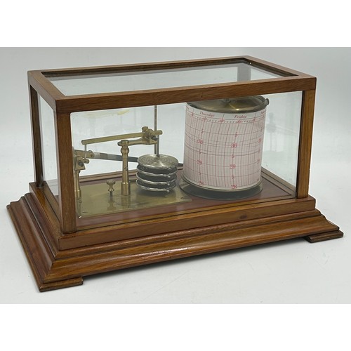 953 - A 20thC brass mounted barograph in a mahogany case with glazed panels fully restored with no makers ... 