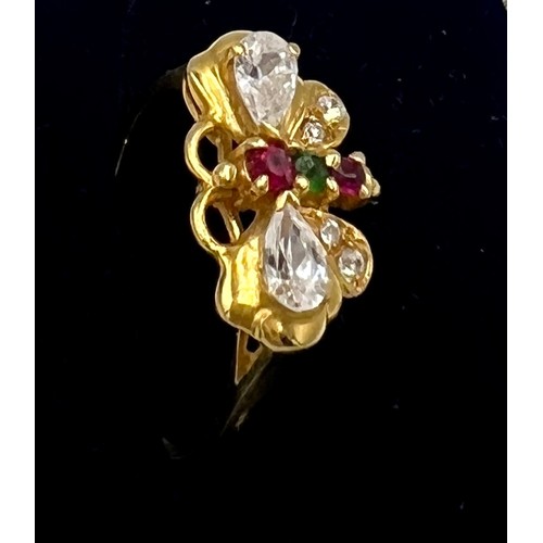 530 - An 18 carat yellow gold gem set ring in the form of a butterfly. Size O. Weight 3gm.