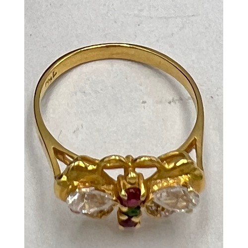 530 - An 18 carat yellow gold gem set ring in the form of a butterfly. Size O. Weight 3gm.