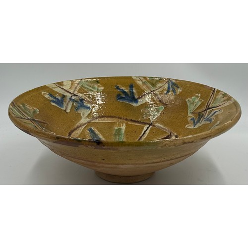 336 - Two terracotta glazed items to include a large bowl with light brown/green/blue flowers 37cm d x 12c... 