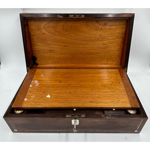 902 - A Rosewood Writing Slope inlaid with mother of pearl and brass carrying handles complete with fitted... 