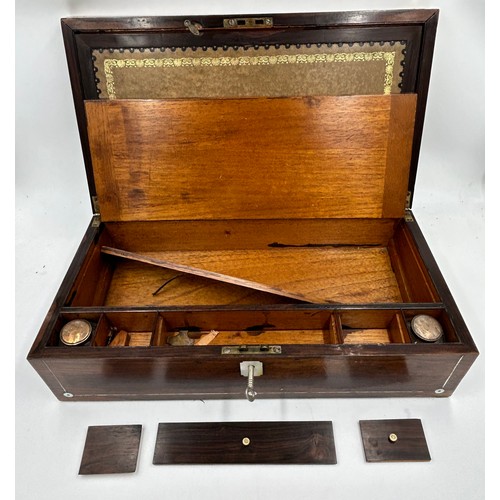 902 - A Rosewood Writing Slope inlaid with mother of pearl and brass carrying handles complete with fitted... 