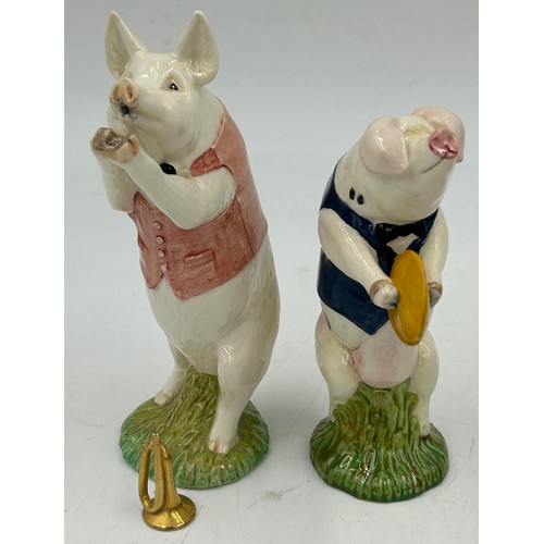 342 - Nine John Beswick pig orchestra figures comprising, Richard with French horn, Matthew with trumpet, ... 