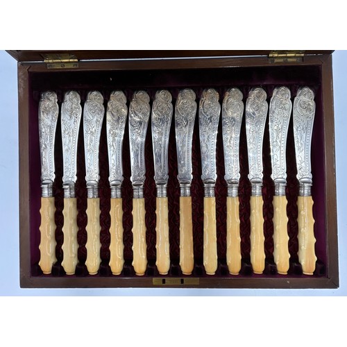 765 - A cased box of 12 engraved silver plated fish knives and forks with hallmarked silver ferrule, Sheff... 