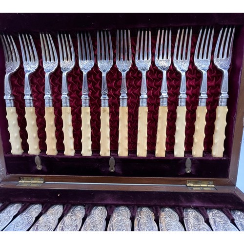 765 - A cased box of 12 engraved silver plated fish knives and forks with hallmarked silver ferrule, Sheff... 