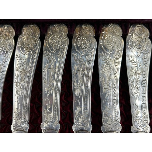 765 - A cased box of 12 engraved silver plated fish knives and forks with hallmarked silver ferrule, Sheff... 