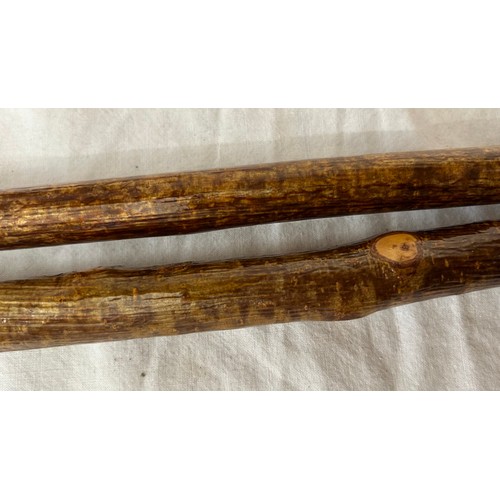 1168 - A collection of 4 sticks to include a pair of shepherds crooks both with carved thistles and initial... 