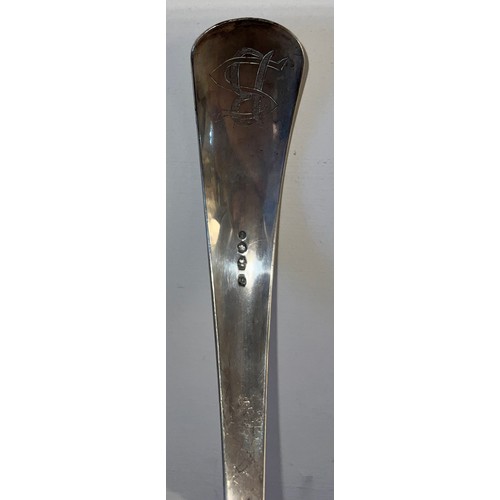 772 - A 19thC Dutch silver ladle, initials to back. 28cm l. Weight 216gm.