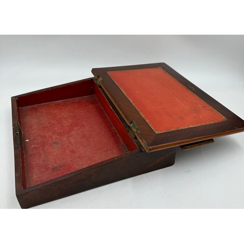 1169 - Writing instruments in a mahogany fitted case, writing slope with green leather surface and red leat... 