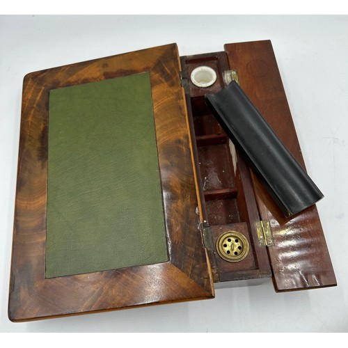 1169 - Writing instruments in a mahogany fitted case, writing slope with green leather surface and red leat... 