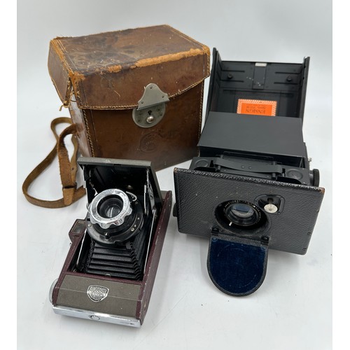 956 - Two Ensign cameras to include Focal Plane Roll Film Reflex aldis uno anastigmat F4.5 4 inch focus al... 