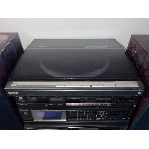 947 - A Technics stereo system to include Direct Drive Automatic Turntable System SL-L3, Quartz Synthesise... 