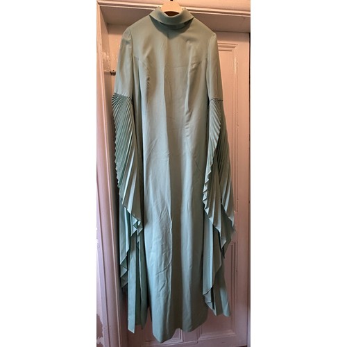 868 - Vintage 1960's clothing : a mint green full length evening dress by Ursula Bernard, labelled 40 with... 