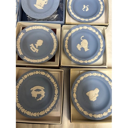 349 - A large quantity of Wedgwood Jasperware pin dishes comprising 2 x Portland blue, 2 x pink (Aurora 80... 