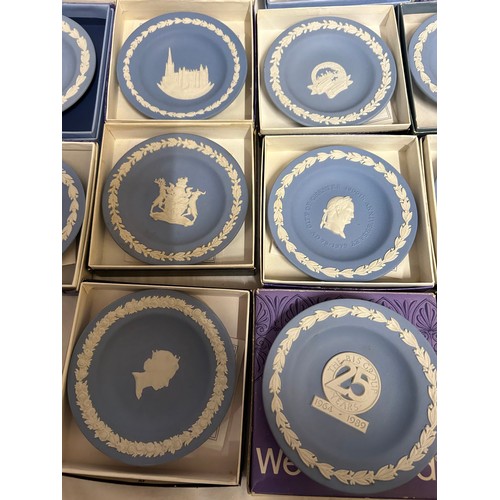 349 - A large quantity of Wedgwood Jasperware pin dishes comprising 2 x Portland blue, 2 x pink (Aurora 80... 