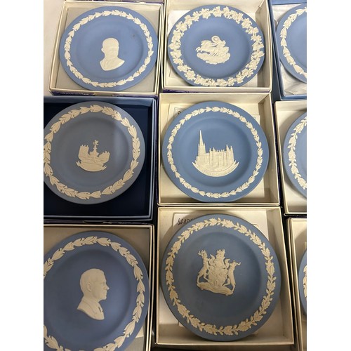 349 - A large quantity of Wedgwood Jasperware pin dishes comprising 2 x Portland blue, 2 x pink (Aurora 80... 