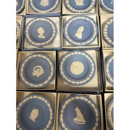 349 - A large quantity of Wedgwood Jasperware pin dishes comprising 2 x Portland blue, 2 x pink (Aurora 80... 