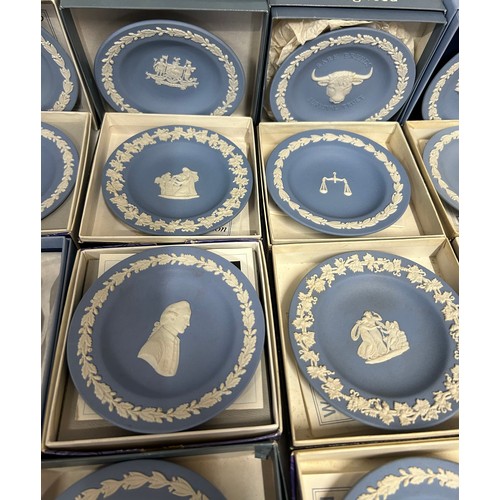 349 - A large quantity of Wedgwood Jasperware pin dishes comprising 2 x Portland blue, 2 x pink (Aurora 80... 