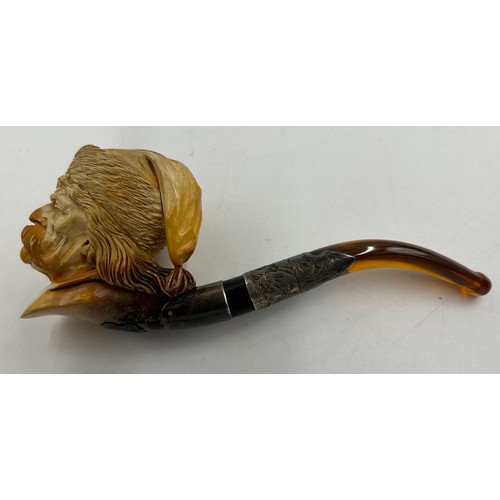 1171 - Five pipes to include two meerschaum both with amber stems, one with white metal mounts in fitted ca... 