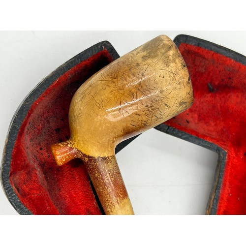 1171 - Five pipes to include two meerschaum both with amber stems, one with white metal mounts in fitted ca... 