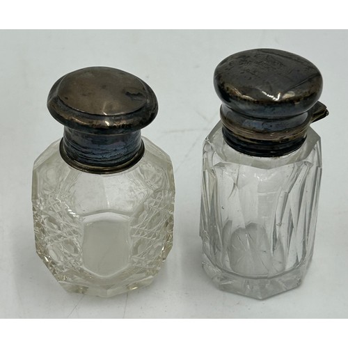 774 - A collection of 5 silver topped/collared scent bottles and 3 others. Tallest 14.5cm. Most a/f.