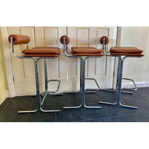 24 - Three Pieff chrome and brown vinyl bar stools. Height to back 85.5cm. 43cm wide. 46.5cm d.