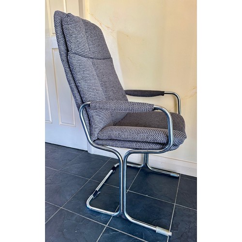 26 - A set of eight Pieff chrome and fabric dining chairs. Two with higher backs together with a matching... 