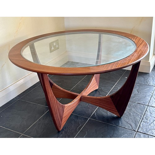 27 - A G Plan style teak and glass circular coffee table 84cm d x 46cm h.