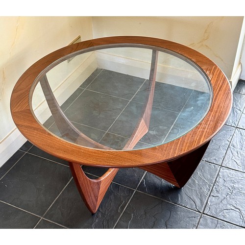 27 - A G Plan style teak and glass circular coffee table 84cm d x 46cm h.