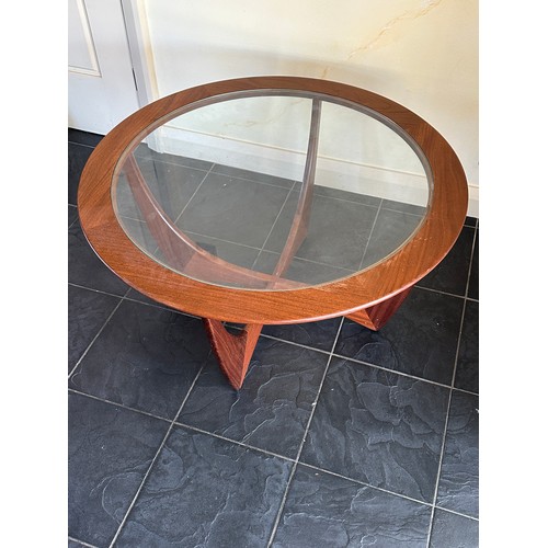 27 - A G Plan style teak and glass circular coffee table 84cm d x 46cm h.