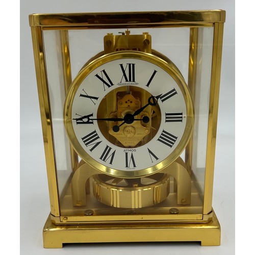 983 - A Jaeger le Coultre Atmos clock, gilt brass cased, white chapter ring, Roman numerals, fifteen jewel... 