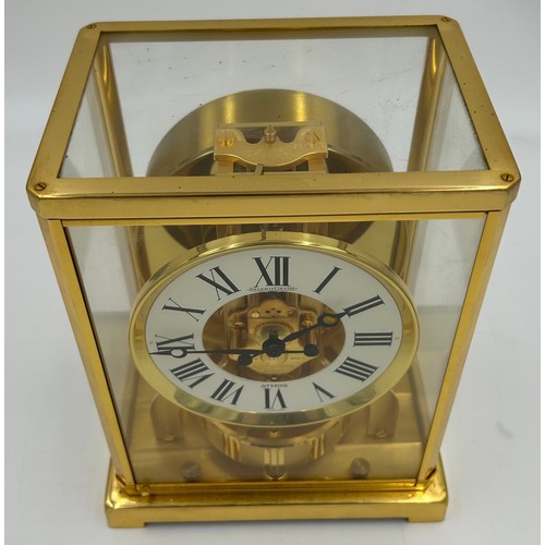 983 - A Jaeger le Coultre Atmos clock, gilt brass cased, white chapter ring, Roman numerals, fifteen jewel... 