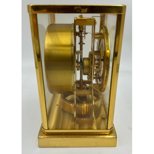 983 - A Jaeger le Coultre Atmos clock, gilt brass cased, white chapter ring, Roman numerals, fifteen jewel... 