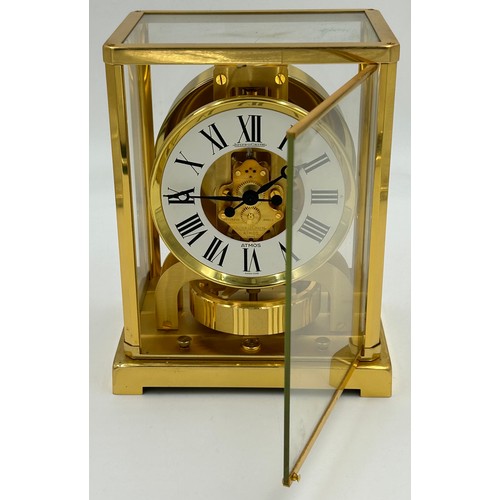 983 - A Jaeger le Coultre Atmos clock, gilt brass cased, white chapter ring, Roman numerals, fifteen jewel... 