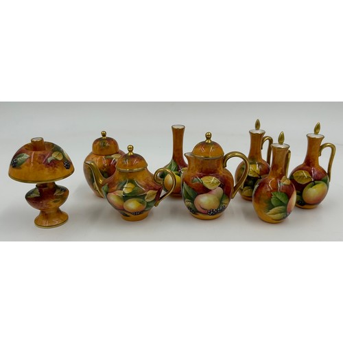 351 - A collection of Caverswall miniature ceramics with fruit design all hand painted by D. Millar and si... 