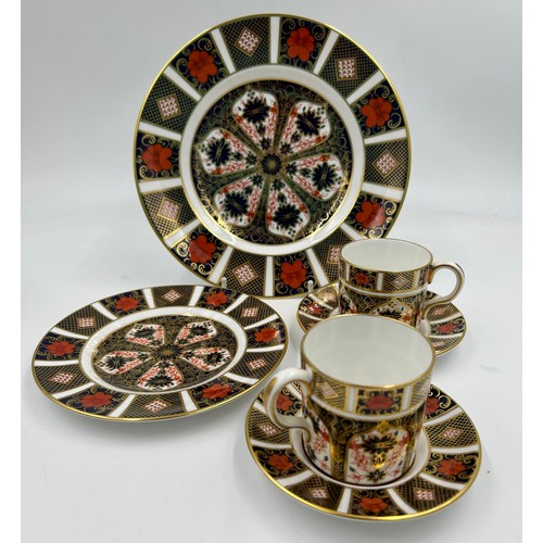 355 - Royal Crown Derby. Old Imari 1128 pattern to include 1 x  plate 22cm, 2 x coffee cans and saucers, 1... 