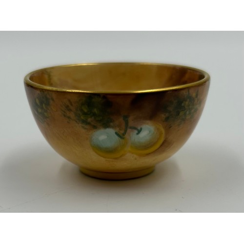 356 - A Royal Worcester miniature sugar bowl decorated with fruit by Roberts. 5.1cm.