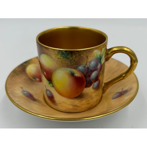 361 - A Royal Worcester coffee can and saucer and a cabinet cup and saucer, both painted with fruit on a m... 