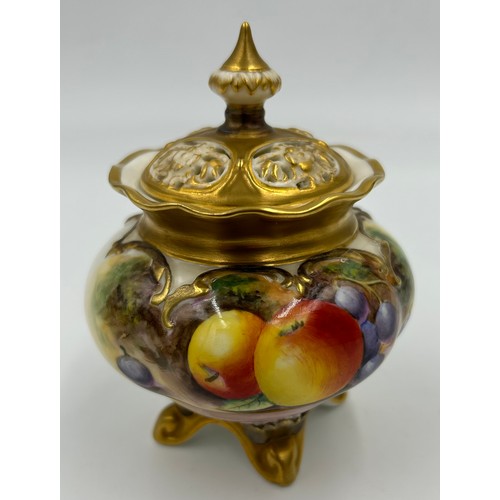 373 - A Royal Worcester pot pourri lidded vase half decorated with fruit and moss background signed Robert... 