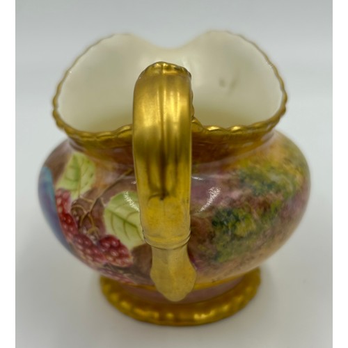 374 - A Royal Worcester sugar bowl 11.5cm d and milk jug 9cm h decorated with plums and berries on a moss ... 