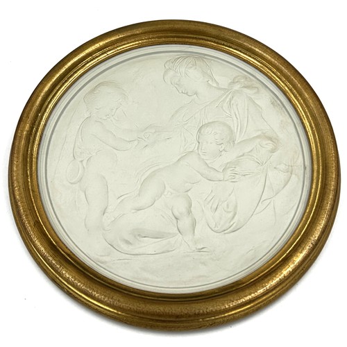 384 - A Wedgwood white jasper Madonna and Child plaque modelled by Arnold Machin OBE RA after the Taddei M... 