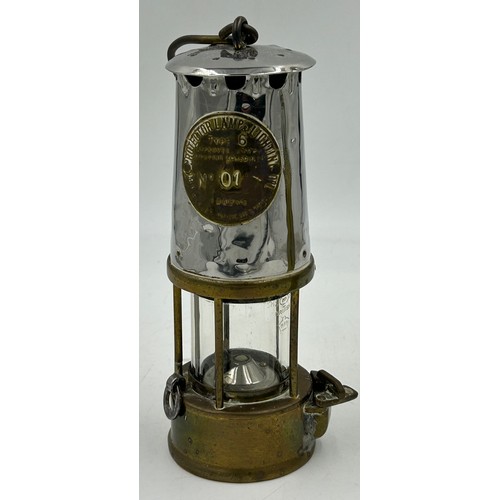 912 - An Eccles Type 6 miners safety lamp by the Protector Lamp and Lighting Co. Ltd. No 01 together with ... 