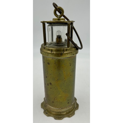 912 - An Eccles Type 6 miners safety lamp by the Protector Lamp and Lighting Co. Ltd. No 01 together with ... 