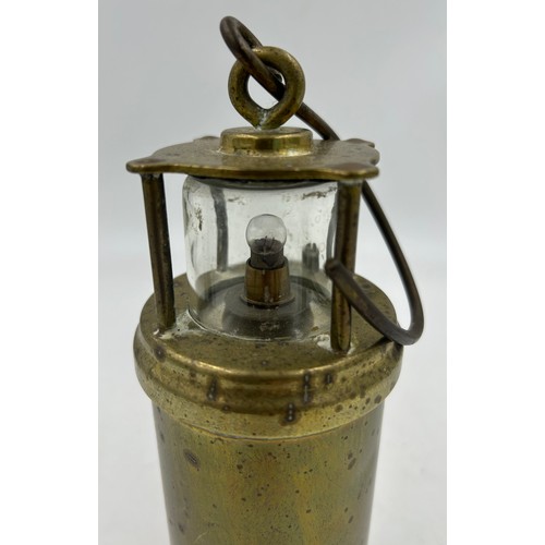 912 - An Eccles Type 6 miners safety lamp by the Protector Lamp and Lighting Co. Ltd. No 01 together with ... 