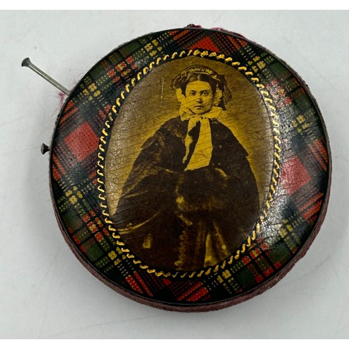 1174 - A miscellany to include a tartan pin cushion, a carved bone stanhope, 10cm in the form of a parasol ... 