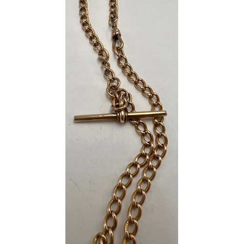 541 - A 9 carat rose gold chain with T bar, Birmingham 1921, weight 18.7gm. 40cm l.