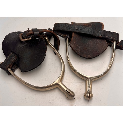 1003 - WWI spurs with leather attachments.