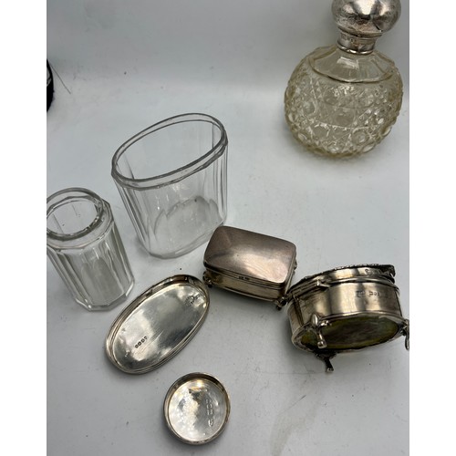 779 - A quantity of glass and silver dressing table pots to include Birmingham 1901, maker Thomas Hayes ob... 